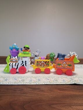 Pre Loved Fisher Price Little People Zoo Train With 5 Animals And Person